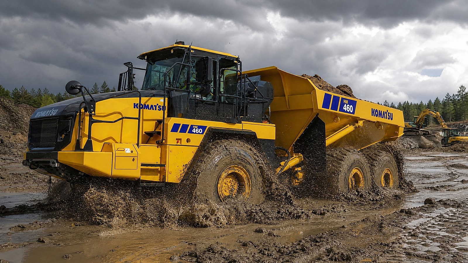 Komatsu HM460-6 navigating difficult terrain